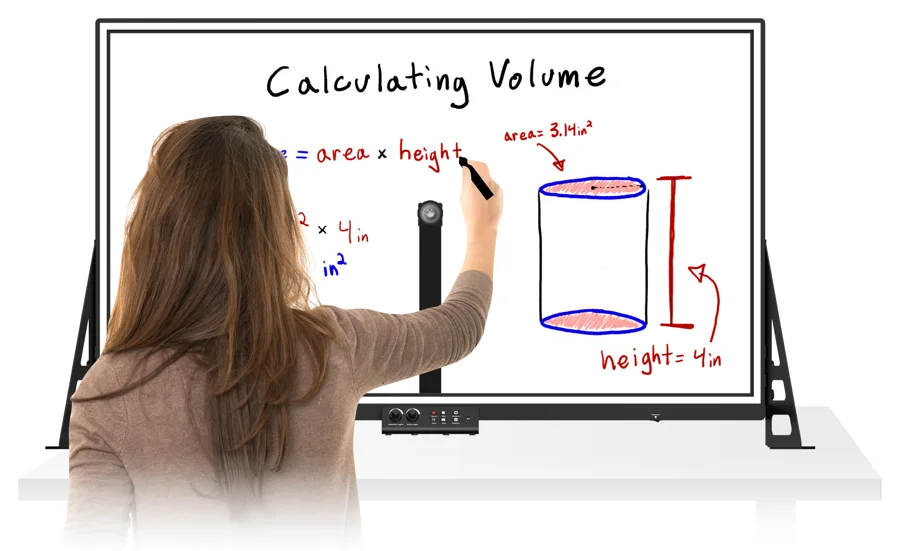 A presenter writes on a 35-inch eGlass lightboard set on a desk.